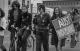 Louise W, Lesley on bicycle - protesting